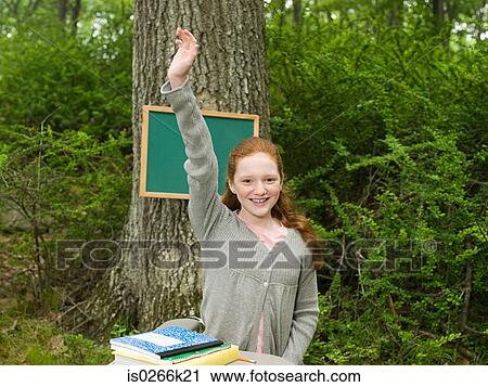 A girl raising her arm View Large Photo Image Stock Image - A girl raising her arm. Fotosearch