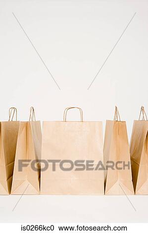 Five paper bags in a row View Large Photo Image Stock Image - Five paper bags in a row. Fotosearch