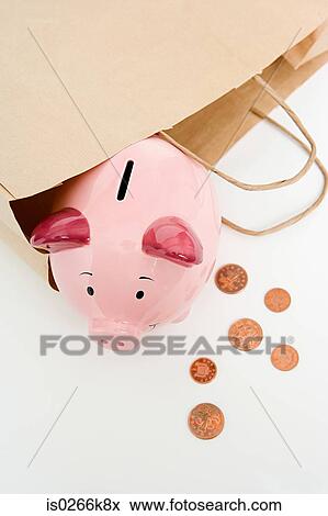Stock Photo - Piggy bank and coins. Fotosearch
