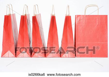 Red shopping bags in a row View Large Photo Image Stock Photograph - Red shopping bags in a row. Fotosearch