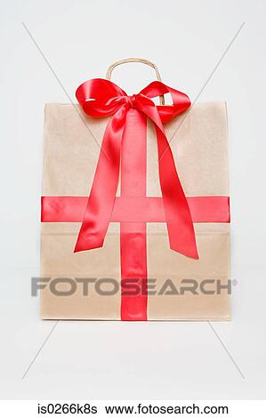 Stock Photograph - Ribbon on a paper bag. Fotosearch