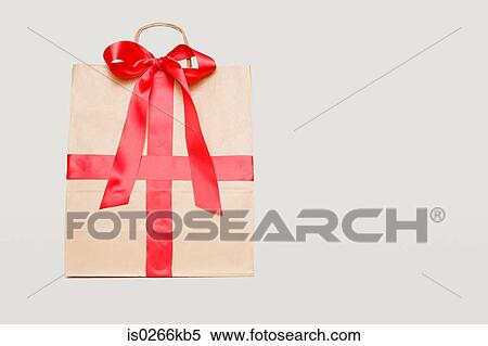 Ribbon on a paper bag View Large Photo Image Stock Photography - Ribbon on a paper bag. Fotosearch