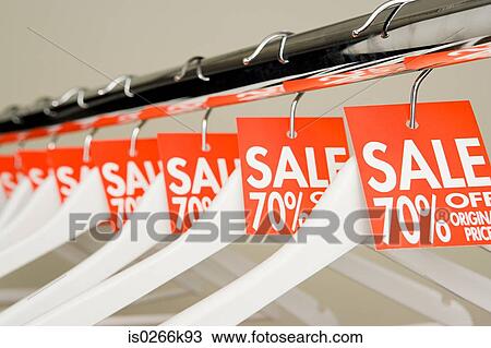 Sale labels on clothes hangers View Large Photo Image Stock Image - Sale labels on clothes hangers. Fotosearch