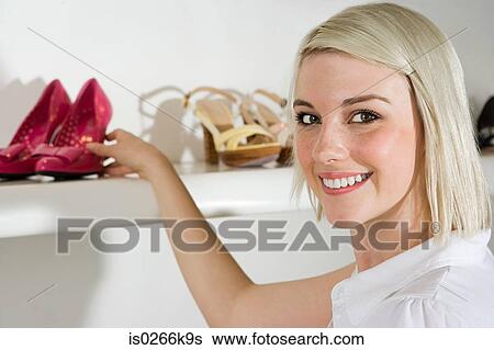 Woman shopping for shoes View Large Photo Image Stock Photograph - Woman shopping for shoes. Fotosearch