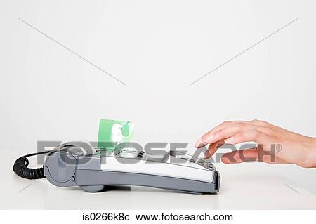 Woman using a chip and pin machine View Large Photo Image Stock Image - Woman using a chip and pin machine. Fotosearch
