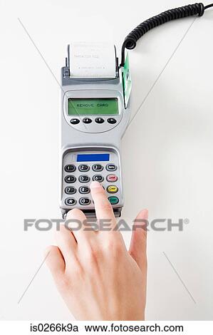 Woman using a chip and pin machine View Large Photo Image Stock Image - Woman using a chip and pin machine. Fotosearch