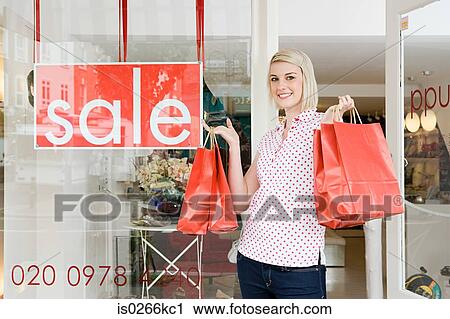 Woman with shopping bags View Large Photo Image Stock Image - Woman with shopping bags. Fotosearch