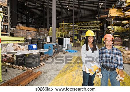 Colleagues in warehouse View Large Photo Image Stock Photography - Colleagues in warehouse. Fotosearch