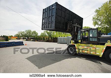 Forklift truck with cargo container View Large Photo Image Picture - Forklift truck with cargo container. Fotosearch