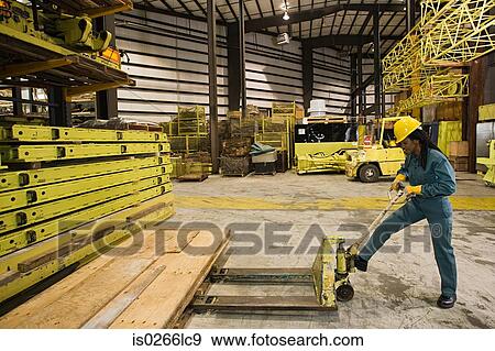 Warehouse worker View Large Photo Image Stock Photo - Warehouse worker. Fotosearch