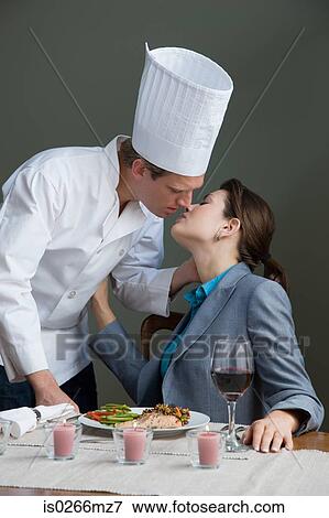 A man and woman kissing View Large Photo Image Stock Photo - A man and woman kissing. Fotosearch