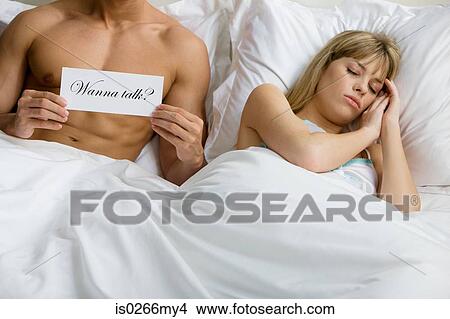 A woman ignoring a man View Large Photo Image Picture - A woman ignoring a man. Fotosearch