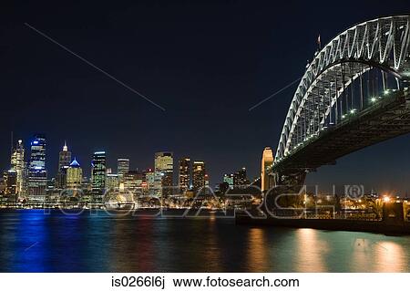 Sydney harbour bridge and skyline at night View Large Photo Image Stock Image - Sydney harbour bridge and skyline at night. Fotosearch