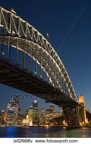 Sydney harbour bridge and skyline at nigh View Large Photo Image Stock Photo - Sydney harbour bridge and skyline at nigh. Fotosearch