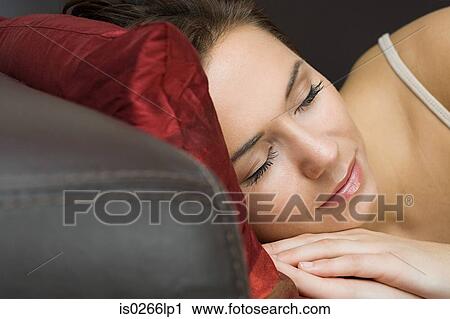 Woman sleeping on sofa View Large Photo Image Stock Image - Woman sleeping on sofa. Fotosearch
