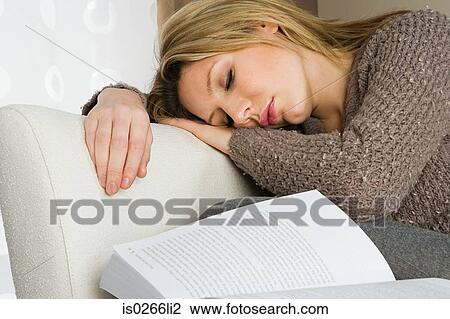 Woman sleeping with book View Large Photo Image Stock Image - Woman sleeping with book. Fotosearch
