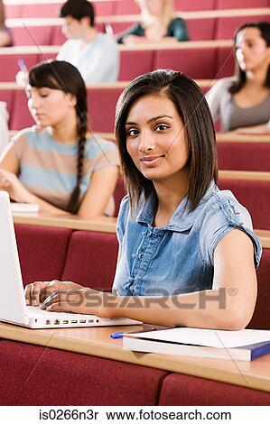 Female student in lecture View Large Photo Image Stock Photography - Female student in lecture. Fotosearch