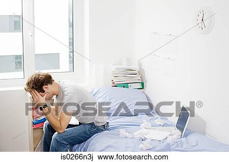 Stock Image - Stressed student. Fotosearch