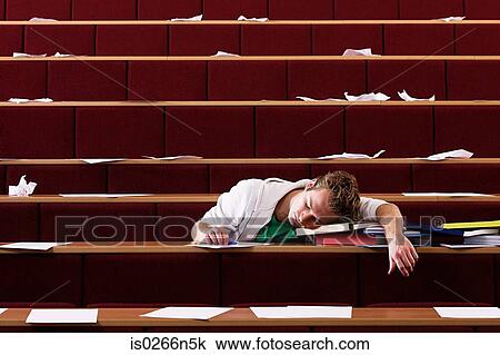 Student sleeping in lecture theatre View Large Photo Image Stock Image - Student sleeping in lecture theatre. Fotosearch