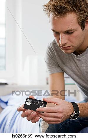 Student with credit card View Large Photo Image Stock Photo - Student with credit card. Fotosearch