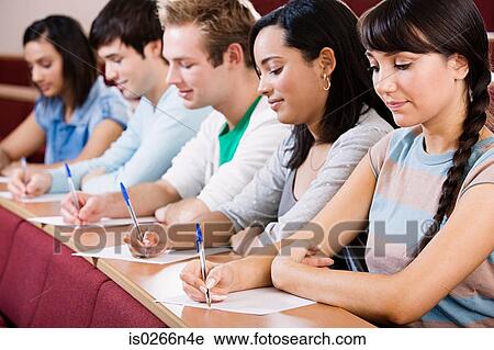 Stock Image - Students in lecture theatre. Fotosearch