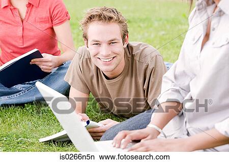 Students working outdoors View Large Photo Image Picture - Students working outdoors. Fotosearch