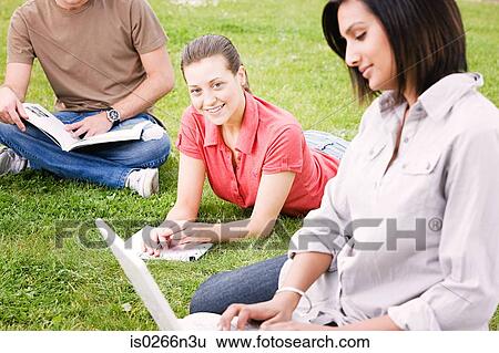 Students working outdoors View Large Photo Image Stock Photograph - Students working outdoors. Fotosearch