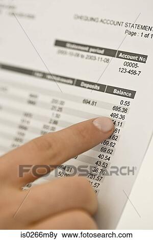 A man holding a bank statement View Large Photo Image Stock Photo - A man holding a bank statement. Fotosearch