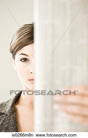 A woman reading the financial paper View Large Photo Image Picture - A woman reading the financial paper. Fotosearch