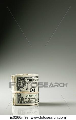 Stock Photograph - Rolled up banknotes. Fotosearch