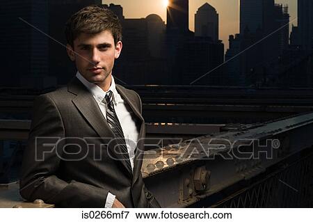 Businessman at sunset View Large Photo Image Stock Photo - Businessman at sunset. Fotosearch