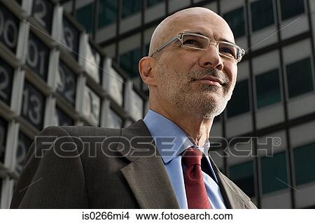 Head and shoulders of a senior businessman View Large Photo Image Picture - Head and shoulders of a senior businessman. Fotosearch