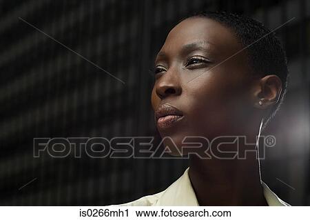 Headshot of an African businesswoman View Large Photo Image Stock Image - Headshot of an African businesswoman. Fotosearch