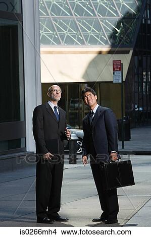 Japanese and caucasian businessmen View Large Photo Image Picture - Japanese and caucasian businessmen. Fotosearch