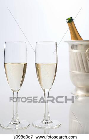 Bottle of champagne and flutes View Large Photo Image Stock Photo - Bottle of champagne and flutes . Fotosearch
