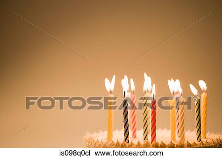 Candles on a birthday cake View Large Photo Image Stock Image - Candles on a birthday cake. Fotosearch