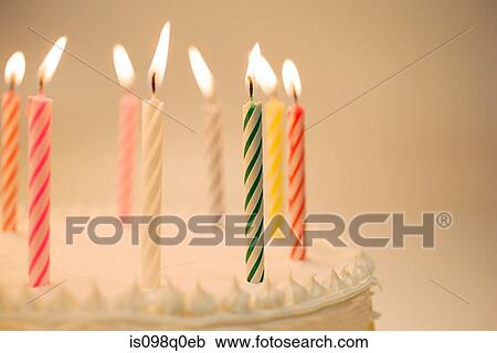 Candles on a birthday cake View Large Photo Image Stock Image - Candles on a birthday cake. Fotosearch