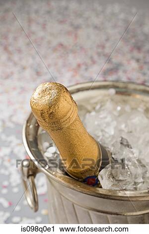 Champagne in an ice bucket View Large Photo Image Stock Image - Champagne in an ice bucket . Fotosearch