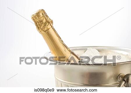 Champagne in an ice bucket View Large Photo Image Stock Photo - Champagne in an ice bucket . Fotosearch