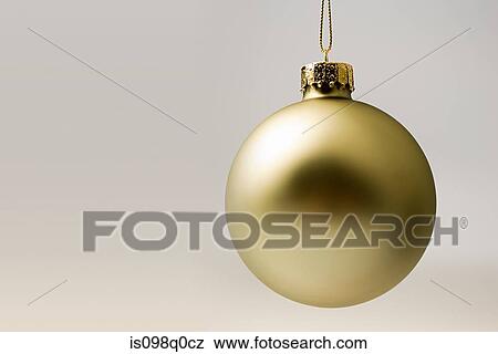 Golden chrtistmas bauble View Large Photo Image Stock Photo - Golden chrtistmas bauble . Fotosearch