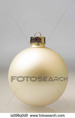 Golden chrtistmas bauble View Large Photo Image Stock Photo - Golden chrtistmas bauble . Fotosearch