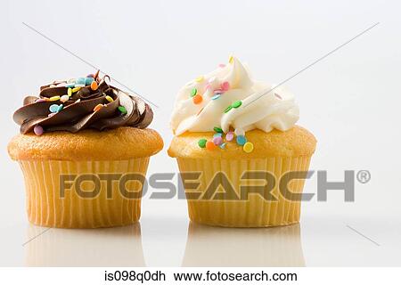 Two cup cakes View Large Photo Image Stock Image - Two cup cakes . Fotosearch