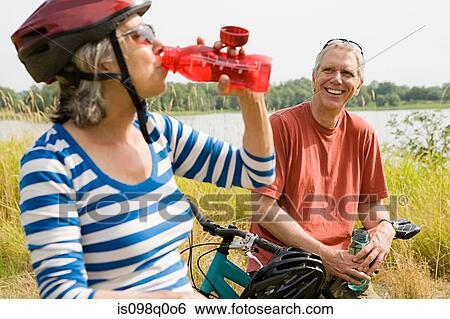 Cyclist drinking View Large Photo Image Stock Photograph - Cyclist drinking. Fotosearch