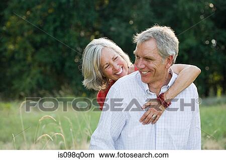 Happy couple outdoors View Large Photo Image Picture - Happy couple outdoors. Fotosearch