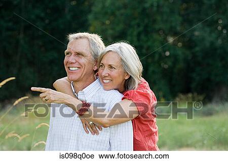 Happy couple outdoors View Large Photo Image Stock Image - Happy couple outdoors. Fotosearch