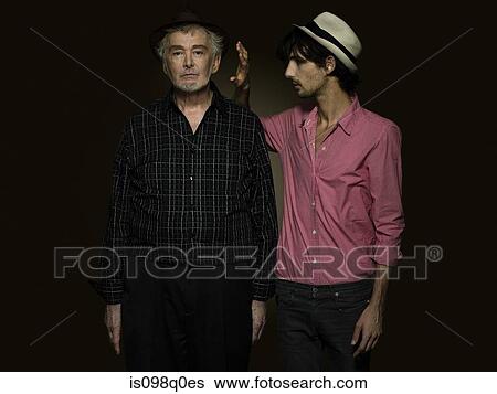 Portrait of a senior and young man View Large Photo Image Stock Photograph - Portrait of a senior and young man. Fotosearch