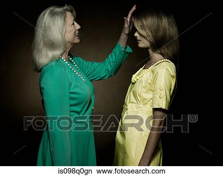 Portrait of a senior and young woman View Large Photo Image Picture - Portrait of a senior and young woman. Fotosearch