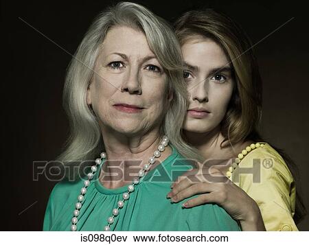 Portrait of a senior and young woman View Large Photo Image Stock Photo - Portrait of a senior and young woman. Fotosearch