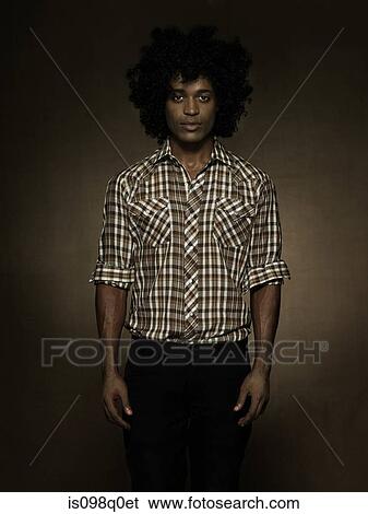 Stock Photograph - Portrait of a young man. Fotosearch