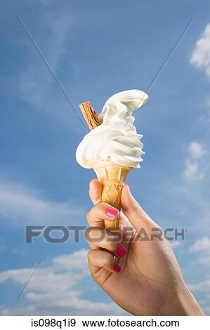 Person with ice cream View Large Photo Image Stock Photo - Person with ice cream. Fotosearch